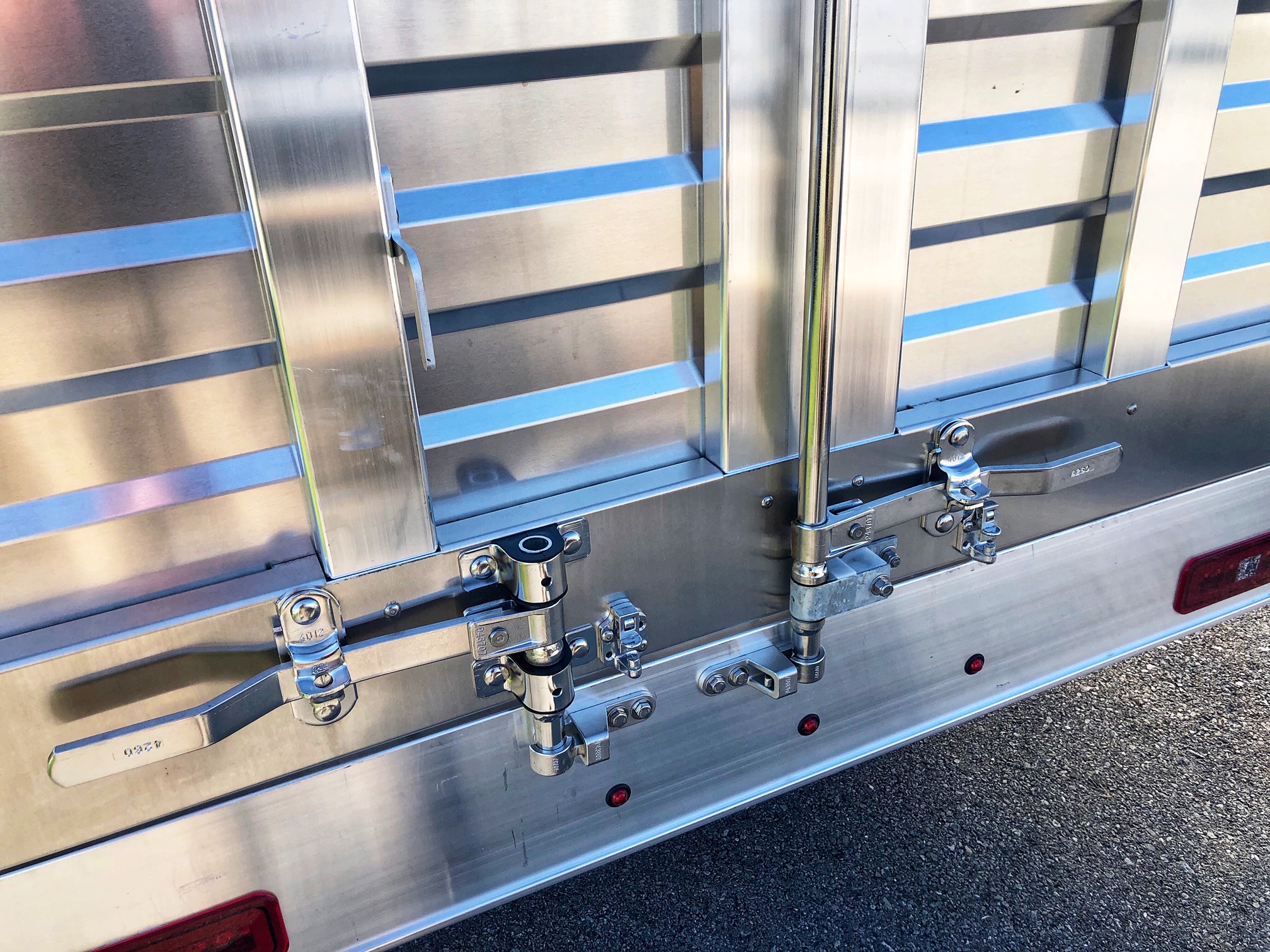 stainless steel lockrods on the back of a truck